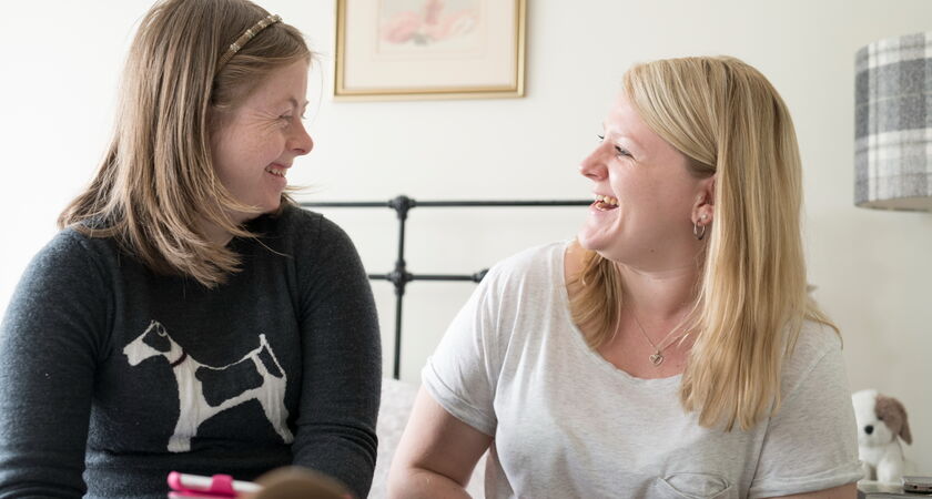 PWS Emily Laughing With Staff Sara